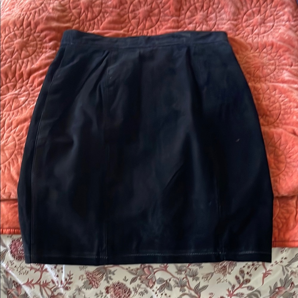 The limited black suede leather skirt